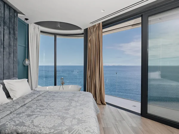 Master suite with freestanding tub and sea view