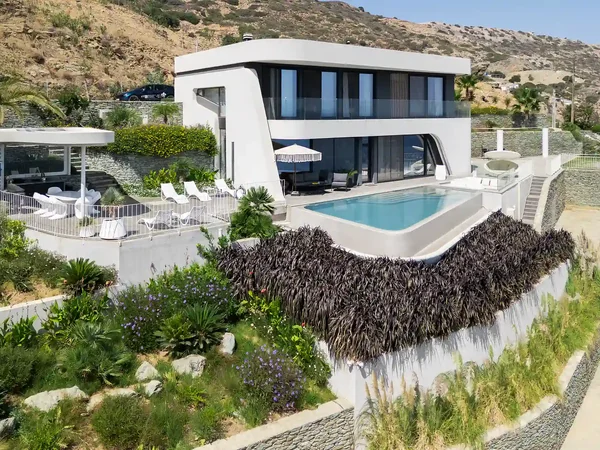 Aerial showing villa and bay